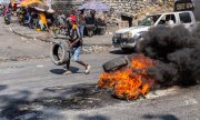 Street in Port-au-Prince on 13 March. (© picture-alliance/Anadolu / Guerinault Louis)