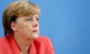 Angela Merkel lors d'une conférence de presse. L'Allemagne s'attend à enregistrer jusqu'à 800.000 demandes d'asile cette année. (© picture-alliance/dpa)
