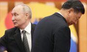 Putin ve Şi buluşmada, işbirliklerinin devam edeceğine vurgu yaptılar. (© picture alliance / Kyodo)