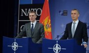 Montenegro's Foreign Minister Igor Lukšić (left, with Nato chief Stoltenberg) talks of a "great day" for his country. (© picture-alliance/dpa)