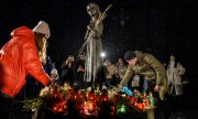 Commémorations au mémorial aux victimes de l'Holodomor, à Kyiv. (© picture-alliance/EPA/OLEG PETRASYUK)