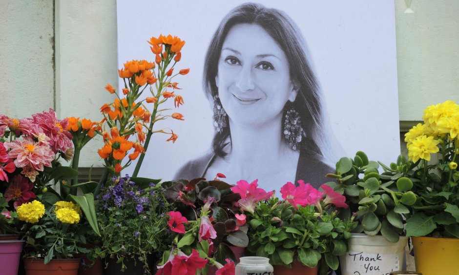 A photograph outside the Courts of Justice building in Valletta comemorating the murdered journalist Daphne Caruana Galizia.