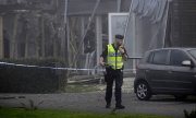 A police officer at the site of an explosion in Uppsala (© picture-alliance/dASSOCIATED PRESS / Anders Wiklund / TT)