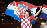 Une supportrice croate, à Munich, après la victoire de l'équipe au damier en quart de finale. (© picture-alliance/dpa)