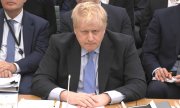 Борис Джонсон даёт показания в Палате общин, 22 марта 2023 года. (© picture-alliance/Associated Press/House of Commons/UK Parliament)