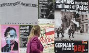 Posters in Warsaw calling for war reparations payments from Germany. (© picture-alliance/dpa)