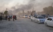 Civilians fleeing the city of Ras al-Ayn on the evening of October 9, 2019. (© picture-alliance/dpa)