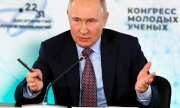 Путин на Конгрессе молодых учёных в Сочи 1 декабря 2022 года. (© picture-alliance/Associated Press/Михаил Метцель)