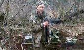 'Слава Украине!' - таковы были последние слова солдата. На видео запечатлён только он, преступники в кадре не появляются. (© picture alliance/Associated Press/Uncredited)