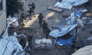 Israeli soldiers on the grounds of al-Shifa Hospital on 15 November. (©picture alliance/ASSOCIATED PRESS/Israel Defence Forces)