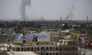Mosul under attack by Iraqi government troops on 22 June. (© picture-alliance/dpa)