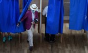 27 июня 2021 года: на избирательном участке в Лионе. (© picture-alliance/Лоран Сиприани)