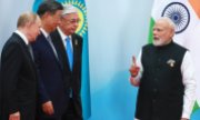 Vladimir Poutine, Xi Jinping, leur homologue kazakhe, Kassym-Jomart Tokaïev, et le Premier ministre indien, Narendra Modi. Dix Etats appartiennent aujourd'hui à l'OCS, qui a été fondée en 2001. (© picture alliance / ZUMAPRESS.com / Vladimir Smirnov)