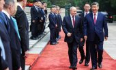 Putin is accompanied to China by a high-level Russian business delegation. (© picture alliance / ZUMAPRESS.com  Alexander Kazakov)