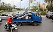 Civilians in Beirut flee Israeli attacks. (© picture alliance / Xinhua News Agency/ Bilal Jawich)