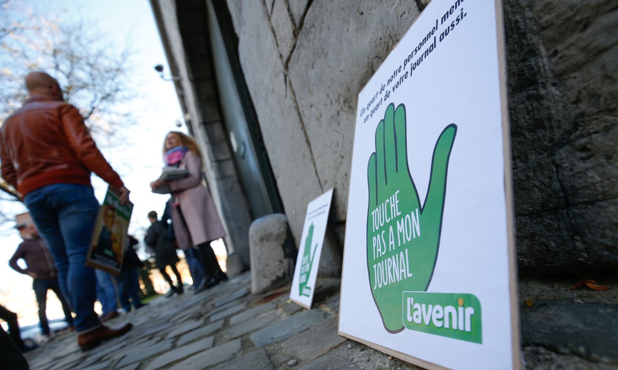 "Hands off my newspaper." Employees of the daily paper L'Avenir protesting against takeover plans in November 2018.