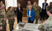EU Commission President Ursula von der Leyen and Danish Prime Minister Mette Frederiksen at an officer training school in Copenhagen on 18 March 2025. (© picture alliance / Ritzau Scanpix / Emil Nicolai Helms)