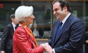 EZB-Präsidentin Christine Lagarde und Kyriakos Pierrakakis vor der Wahl-Sitzung der Euro-Gruppe am 11. Dezember. (© picture alliance / Anadolu / Dursun Aydemir)