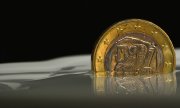 Roughly 70 percent of Greeks want to keep the euro and would be willing to accept austerity measures to that end, according to a recent survey by GPO opinion research institute. (© picture-alliance/dpa)