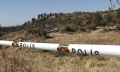 Füzenin düştüğü yerin yakınındaki polis kordonu. (© picture-alliance/dpa)