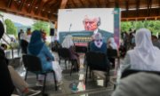 Women in Srebrenica, Bosnia, where 8,000 Muslims were murdered under General Mladić, watch the sentencing. (© picture-alliance/Elman Omic)