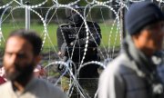 At the Polish-Belarusian border. (© picture-alliance/dpa/Sputnik/Viktor Tolochko)