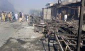 Destructions à Kondoz, le dimanche 8 août. (© Picture Alliance / AP  Abdullah Sahil)