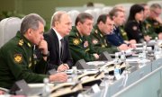 President Vladimir Putin with Defence Minister Sergei Shoigu, left, and Chief of the General Staff of the Russian Armed Forces Valery Gerasimov, third from left, in April 2015. (© picture alliance/AP Images/Alexei Nikolsky)