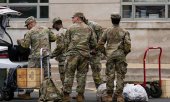 Members of the US National Guard. (© picture-alliance/ASSOCIATED PRESS Julia Demaree Nikhinson)