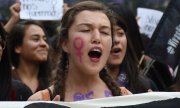 A demonstrator on International Women's Day 2017. (© picture-alliance/dpa)