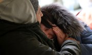 Жертвами войны становится всё больше гражданского населения жертвами. (© picture-alliance/ASSOCIATED PRESS/ Кунихико Миура)