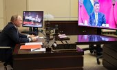 Владимир Путин в ходе видеоконференции с Си Цзиньпином 15 декабря 2021 года. (© picture alliance/ASSOCIATED PRESS/Михаил Метцель)