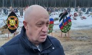 Евгений Пригожин на похоронах одного их наёмников ЧВК Вагнер в Санкт-Петербурге. (© picture-alliance/Associated Press/Uncredited)