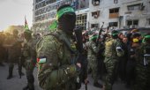 Des combattants des Brigades Al-Qassam, la branche armée du Hamas. (© picture-alliance/ ASSOCIATED PRESS / Abed Hajjar)