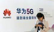Стенд компании Huawei на выставке в Пекине, сентябрь 2018-го года. (© picture-alliance/dpa)