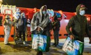 Des migrants à leur arrivée à Lampedusa. (© picture-alliance/Salvatore Cavalli)