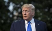 Trump before his departure for London. (© picture-alliance/dpa)