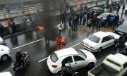 A road blockade in Tehran in the wake of the protests against a hike in gasoline prices (© picture-alliance/dpa)