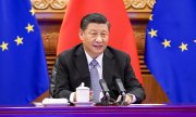 Chinese President Xi Jinping during the video conference with EU leaders. (© picture-alliance/dpa/Li Xueren)