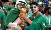 Saudi fans at the 2022 World Cup in Qatar. (© picture-alliance/empics / Mike Egerton)