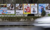 Affiches de référendum, à Genève. (© picture alliance/KEYSTONE / MARTIAL TREZZINI)